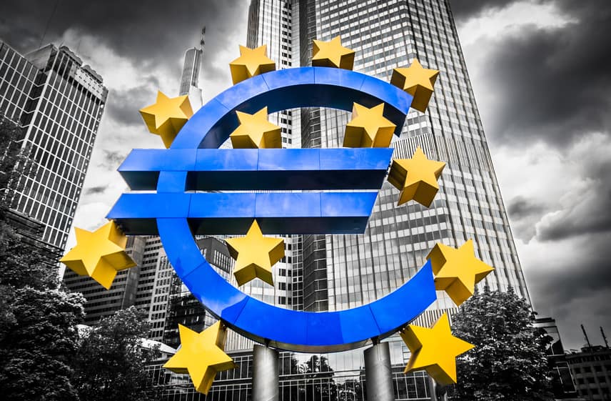 Euro sign with dark dramatic clouds symbolizing financial crisis